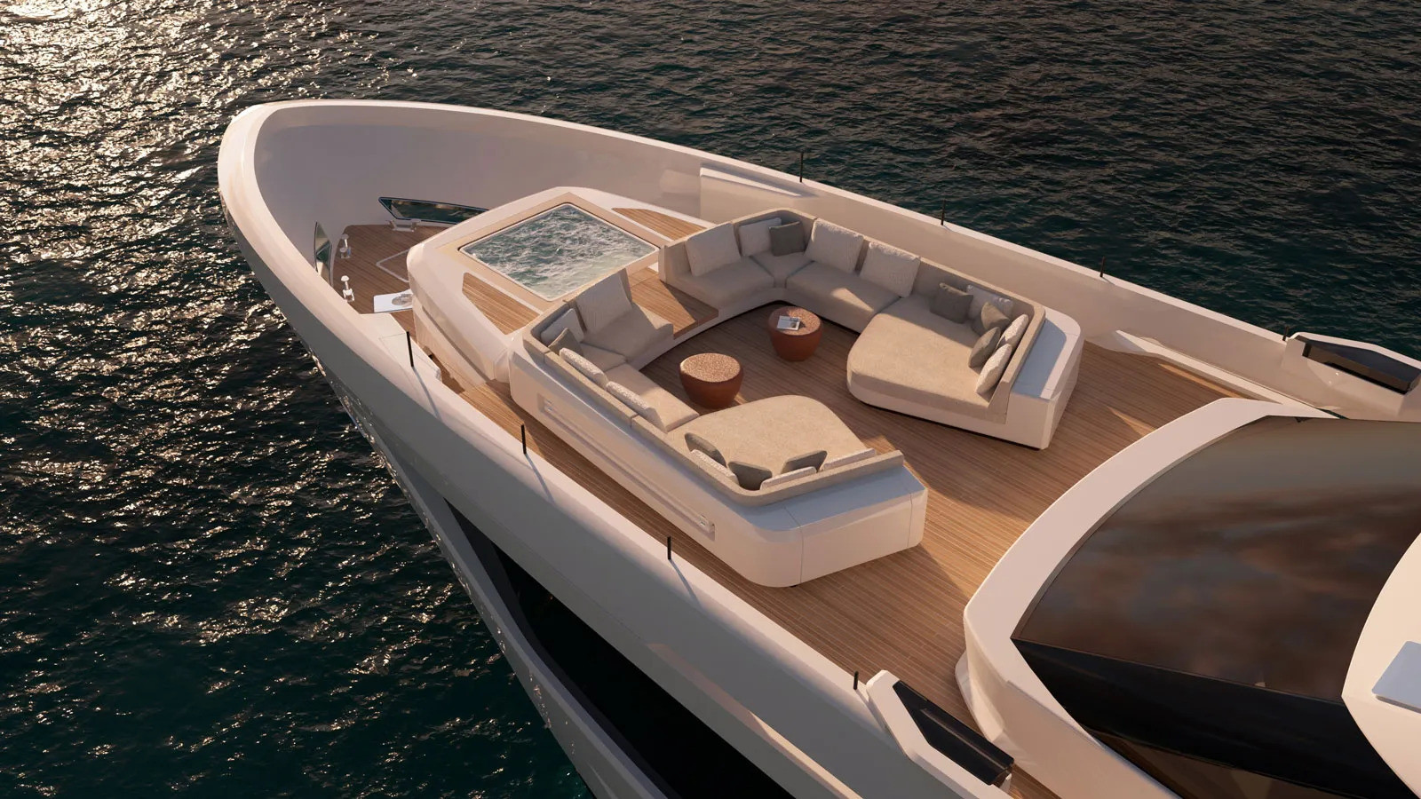 Custom Line Saetta 128' foredeck featuring a jacuzzi, spacious seating areas and sunbathing spaces.