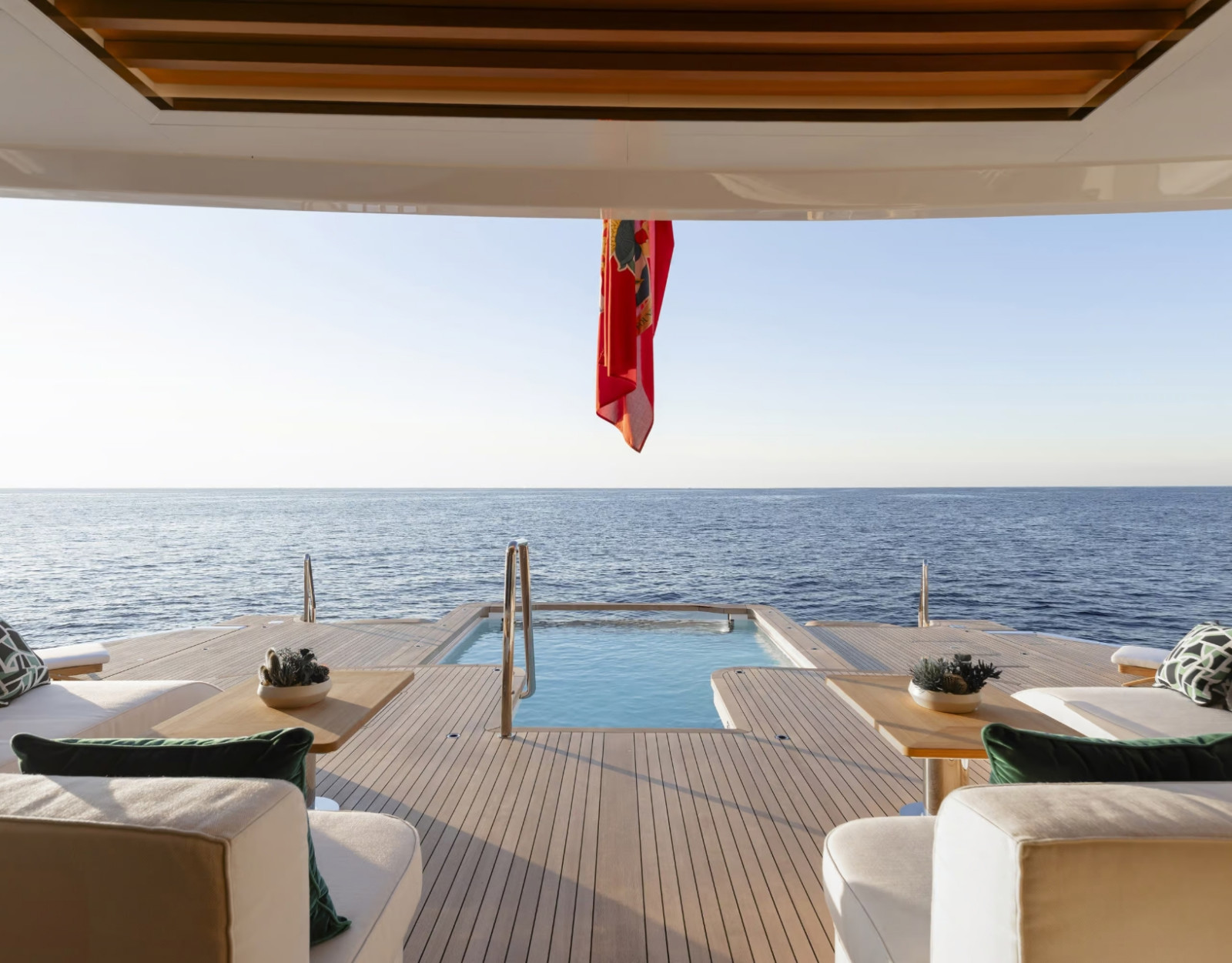 Benetti B.Now 67M Oasis Deck® with an aft pool, open lounge seating and uninterrupted views over the sea.