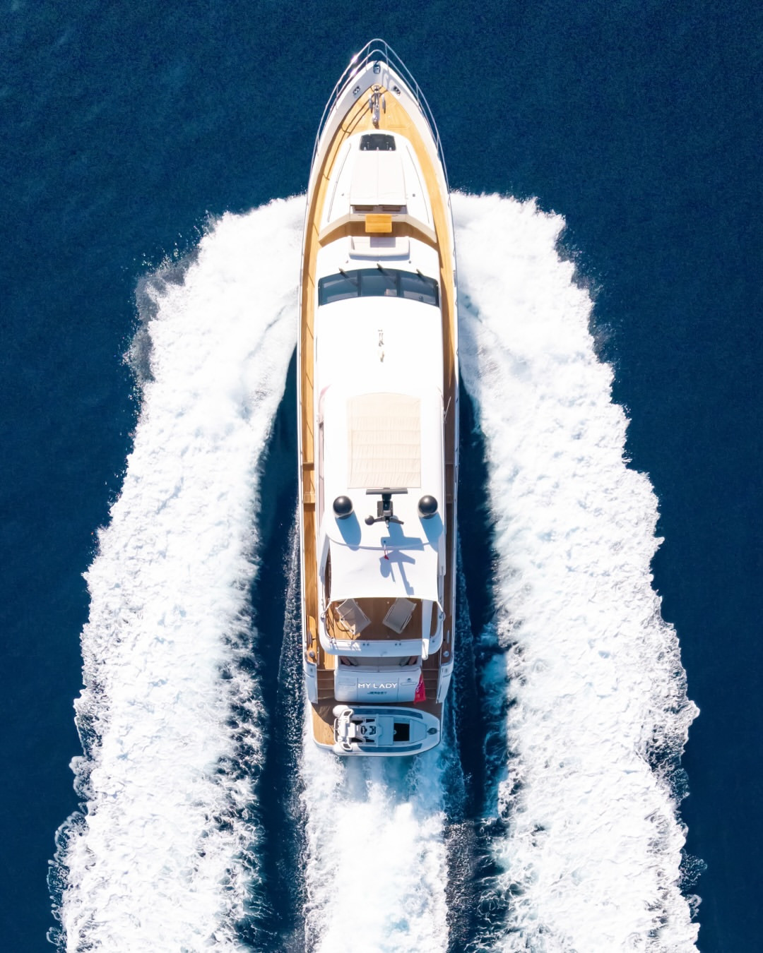 Top-down aerial view of the Princess 72 motor yacht (2015) underway, showcasing its deck layout and performance at sea.