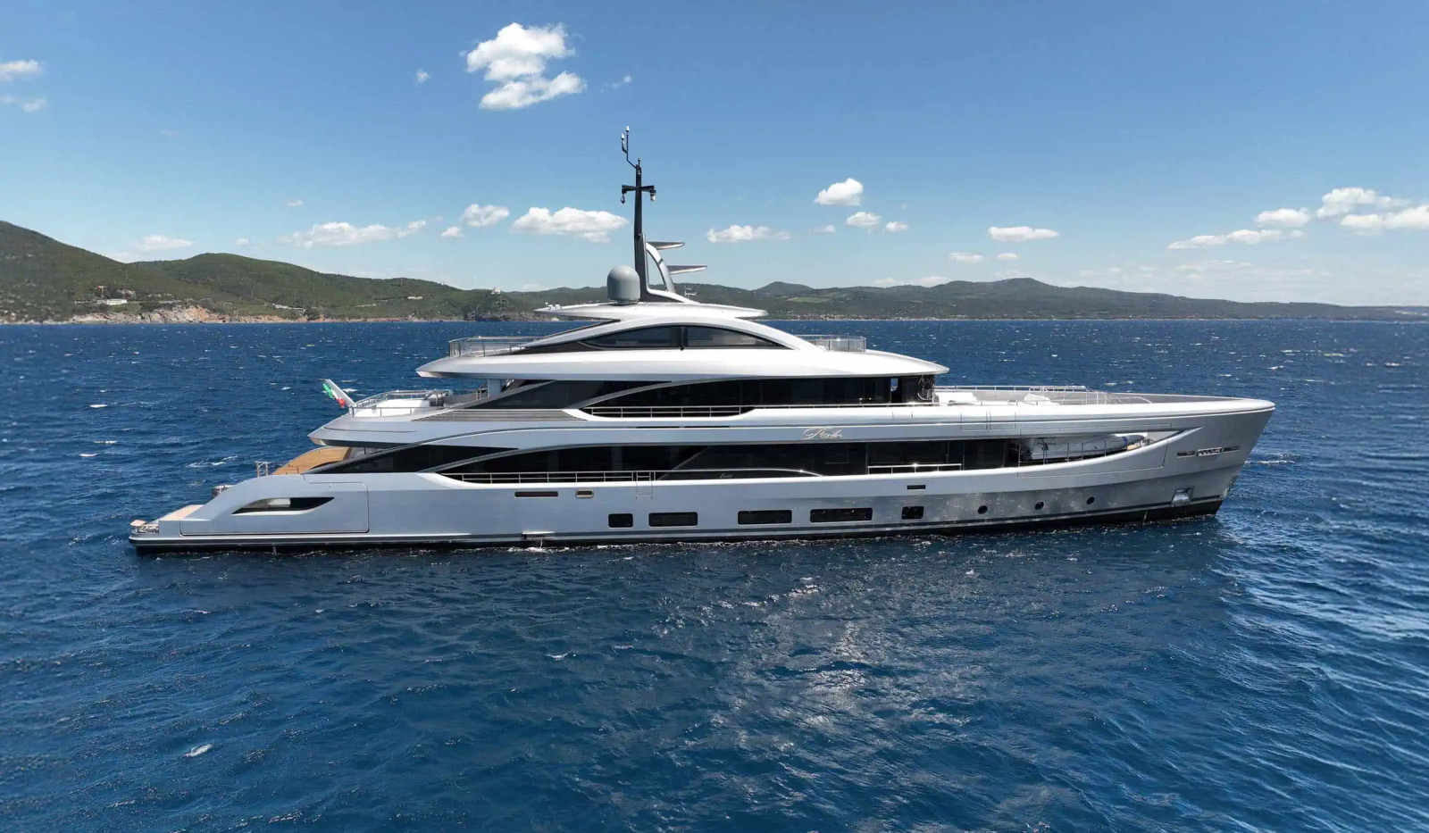 Side profile of the Benetti B.Now 67M showcasing its sleek lines, multi-deck layout and contemporary superyacht design.