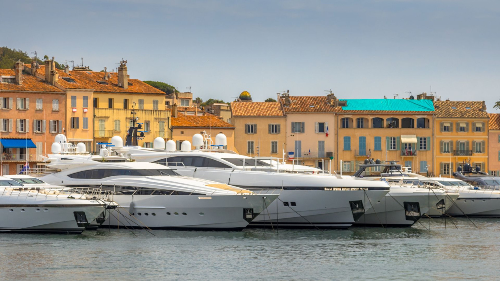 Luxury yachts moored side by side and insurance risks yacht owners may overlook